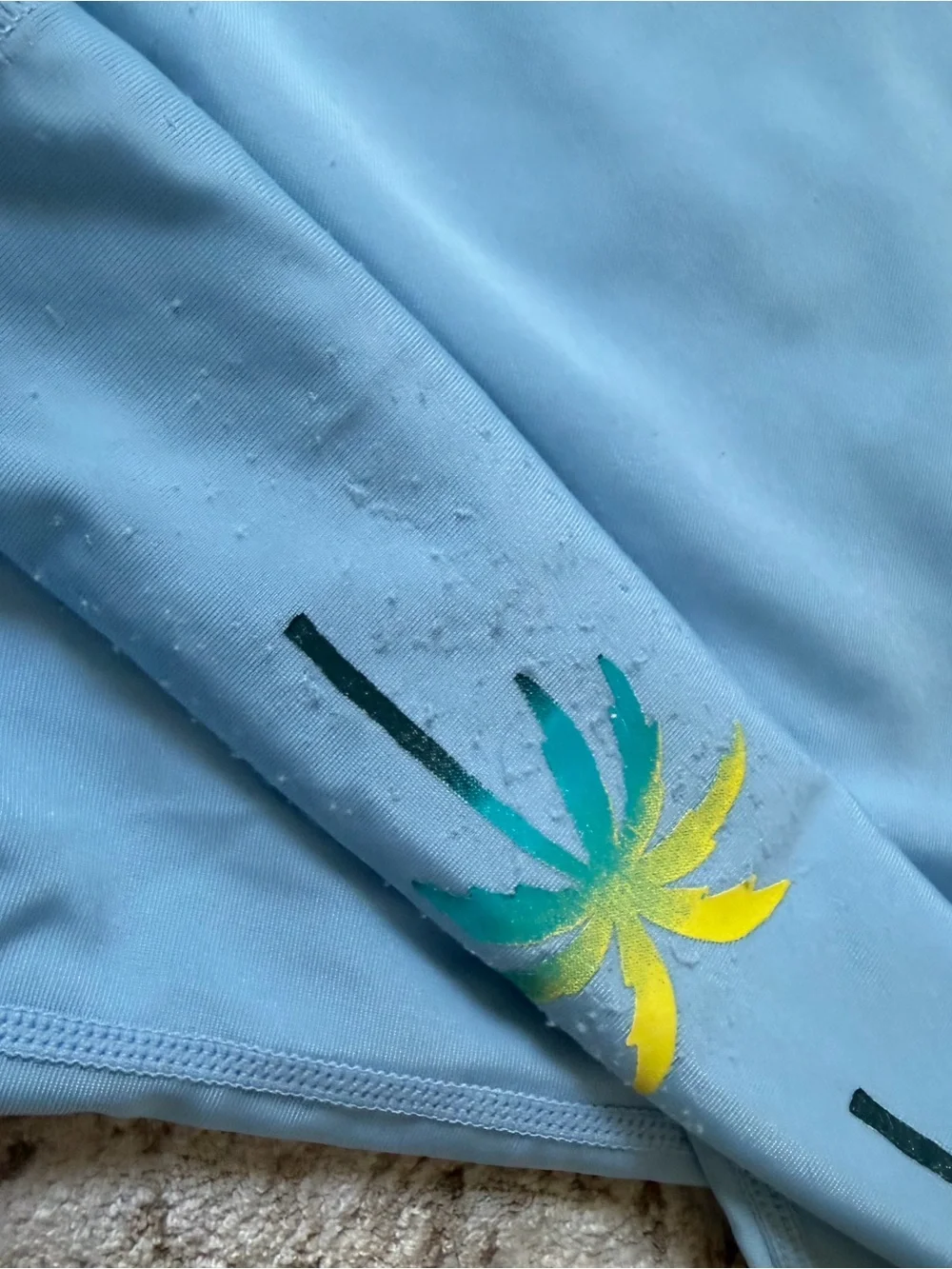 4T - Tea Collection Light Blue Rashguard Top with Tropical Palm Print